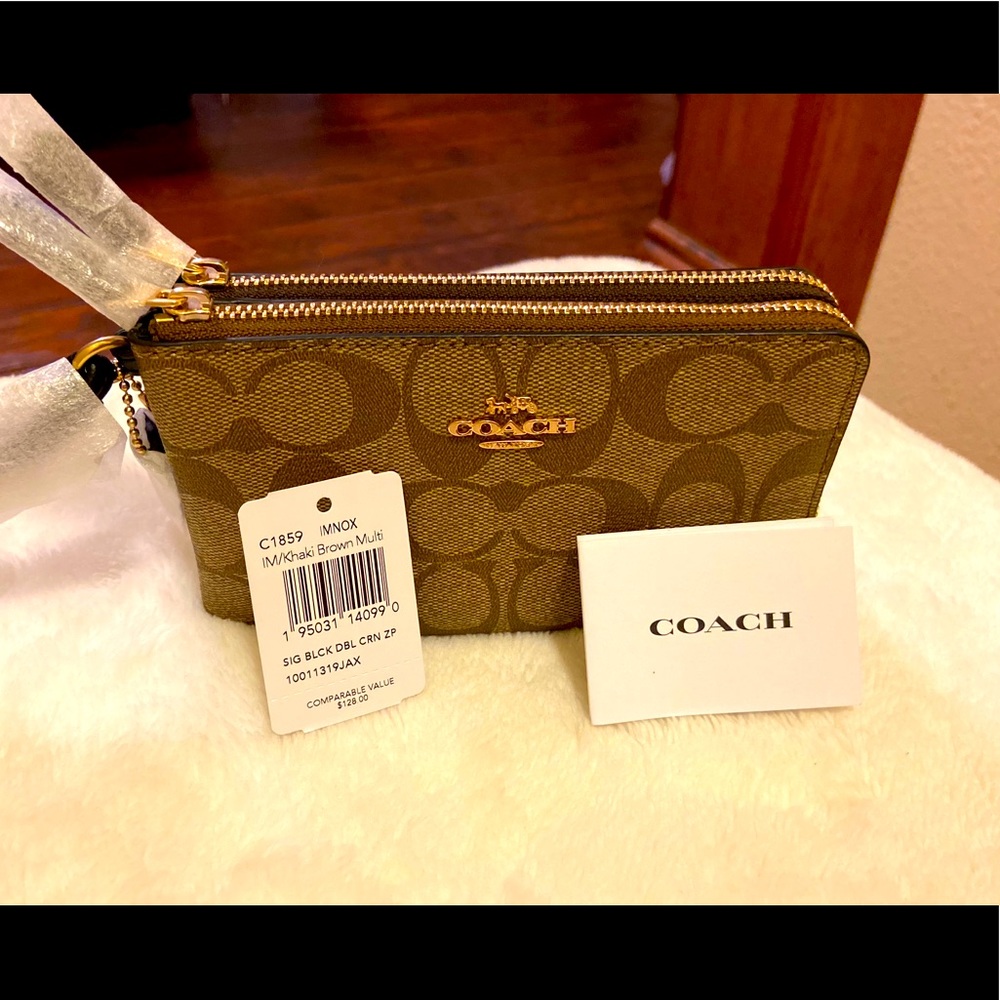 Double Corner Zip Wristlet In Signature Canvas.